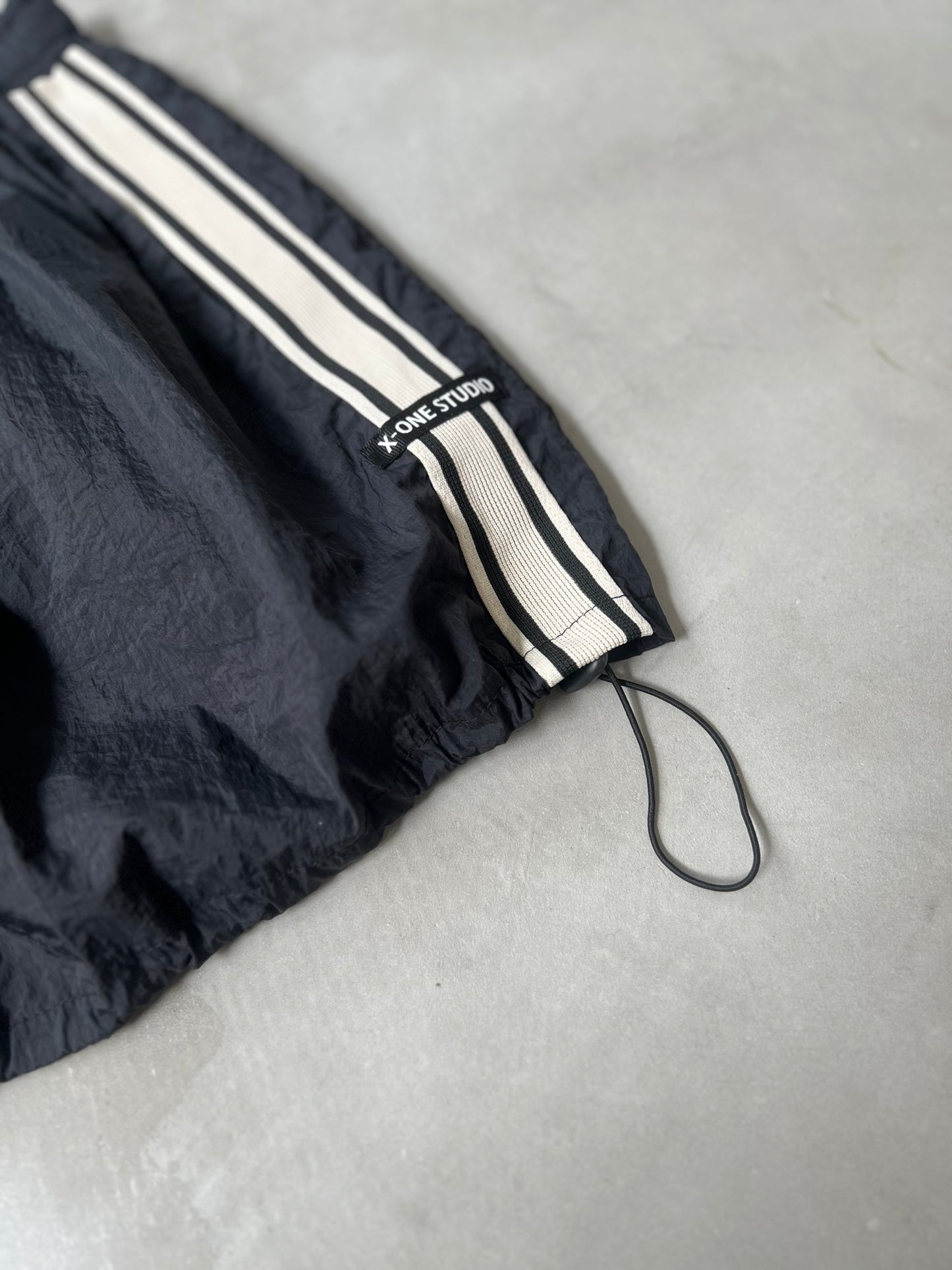 NYLON TRACK SKIRT "BLACK"