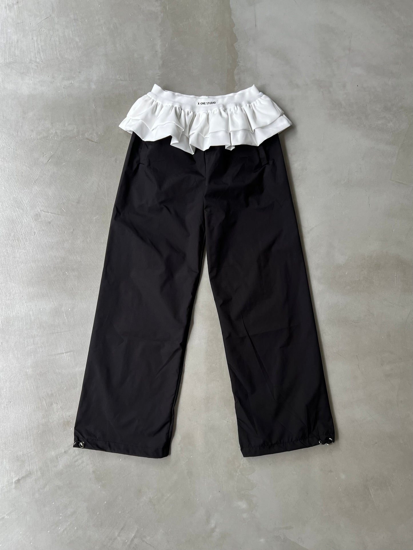 PEPLUM NYLON PANTS