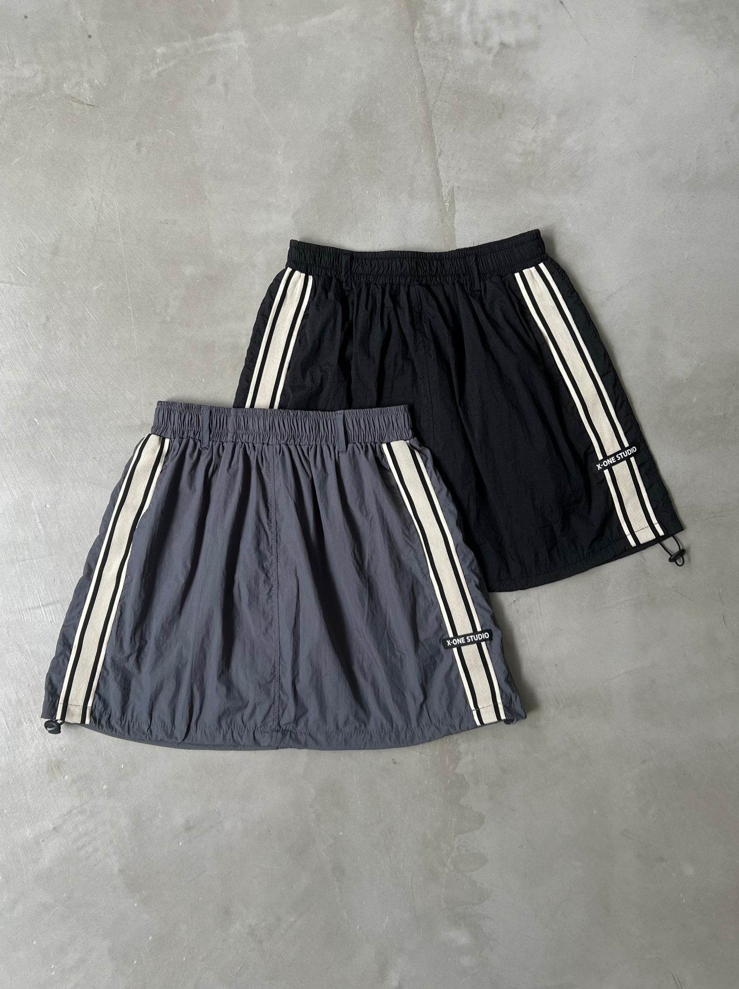 NYLON TRACK SKIRT "BLACK"