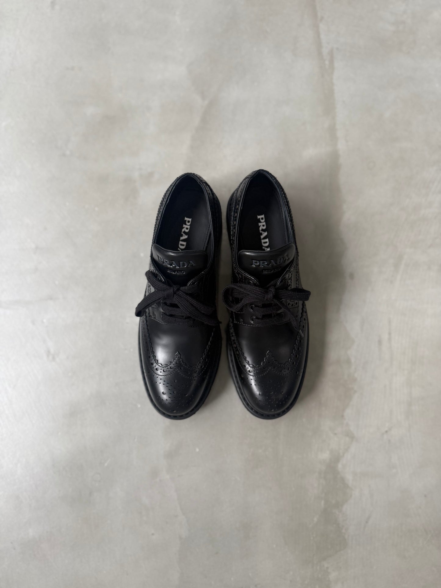 【PRADA】WINGTIP LEATHER LOAFER